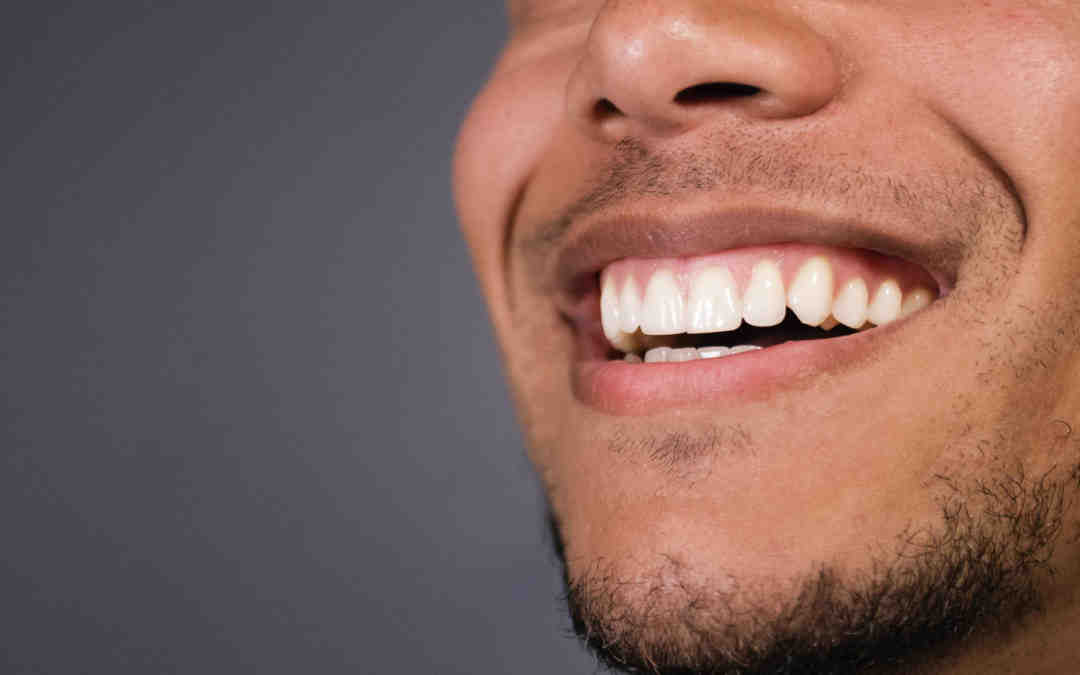 How long does a tooth implant last?